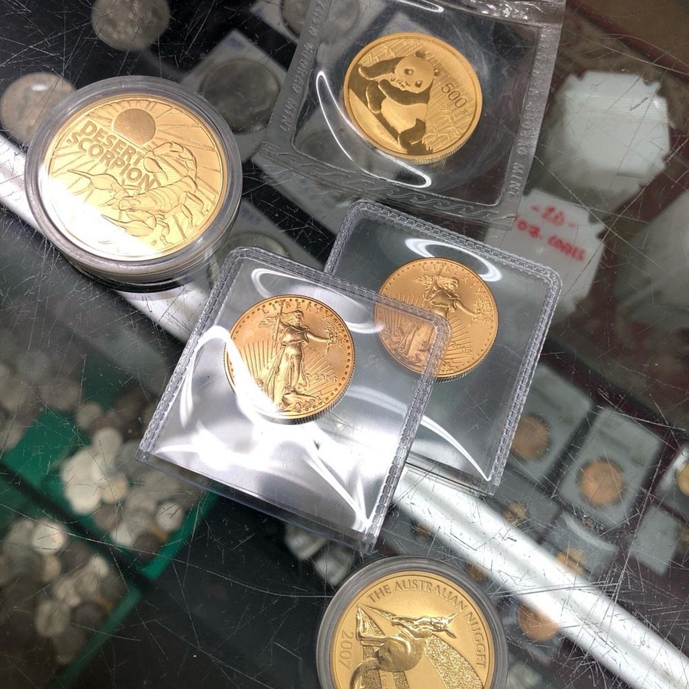 1 ounce 24k Pure Gold coins 99.999 fine Random Numismatics.